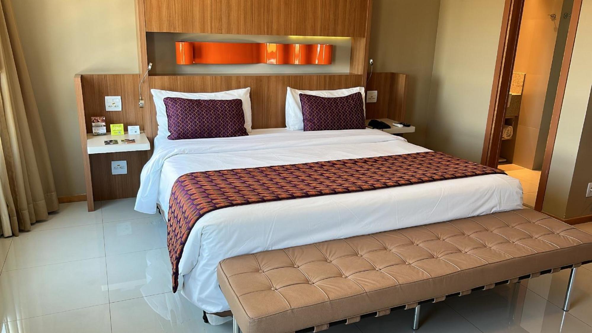 Jade Hotel Μπραζίλια Εξωτερικό φωτογραφία A bed in a hotel room